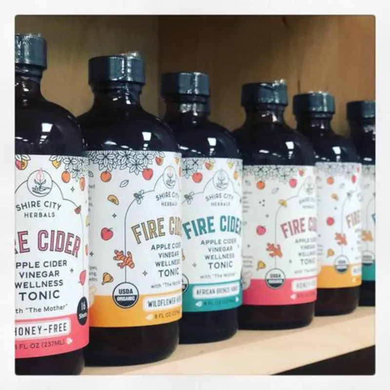 Wellness tonics on a shelf inside Altru Chemists